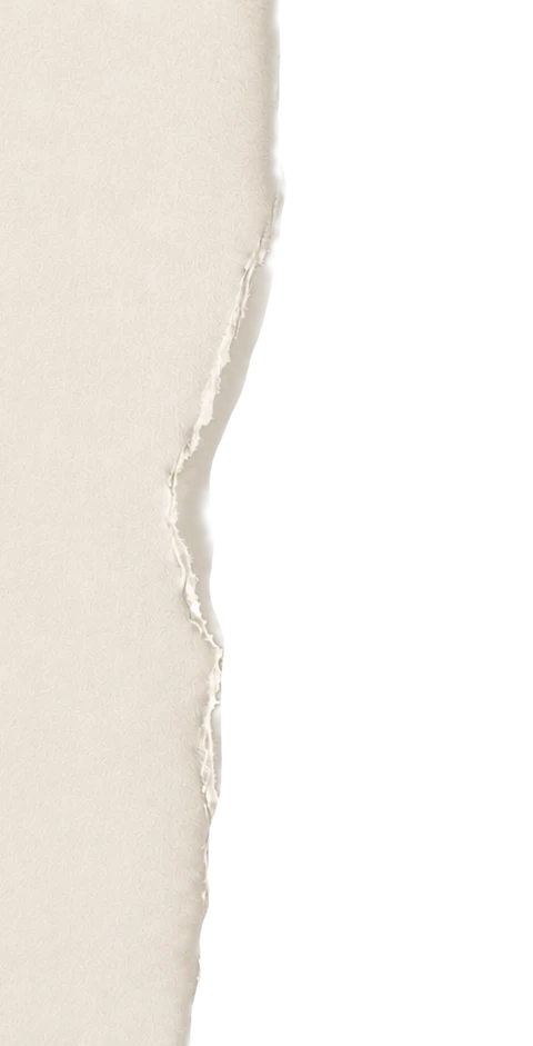 Torn paper opening, light coming through the tear